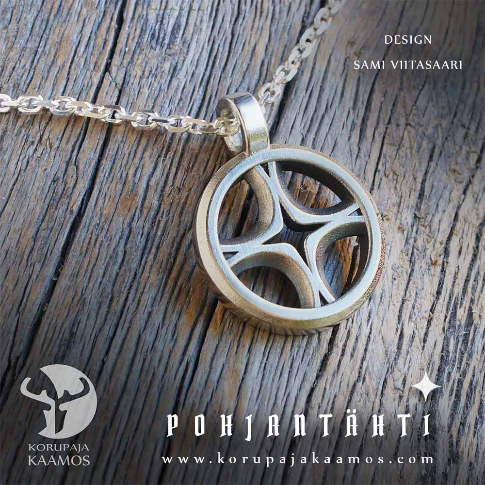 Rippiristi pojalle. Risti-kaulakoru, hopeaa. Pohjantähti-koru, Korupaja Kaamos